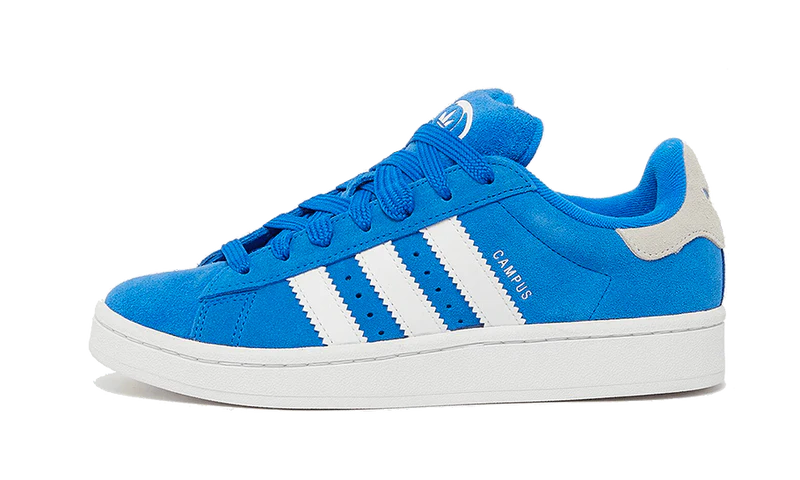 The Adidas Campus 00s Blue Bird is a stylish sneaker with a classic silhouette. It is constructed with a buttery suede upper for comfort and features a white rubber outsole for superior durability.